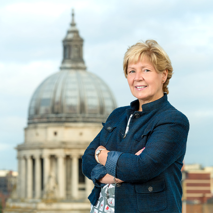 Corporate team image, leadership portrait with city backdrop